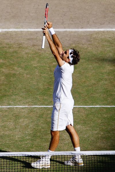 Roger Federer celebrated a record 15th Grand Slam title on Sunday. (Photo from ESPN.com)